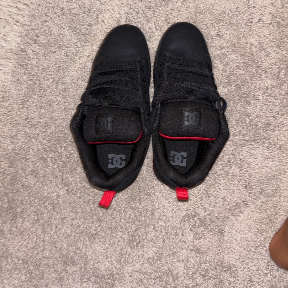 DC Men's Black Sneakers with Red Highlights